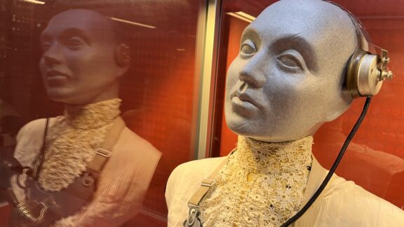 Teledreams exhibiton, doll with old headset